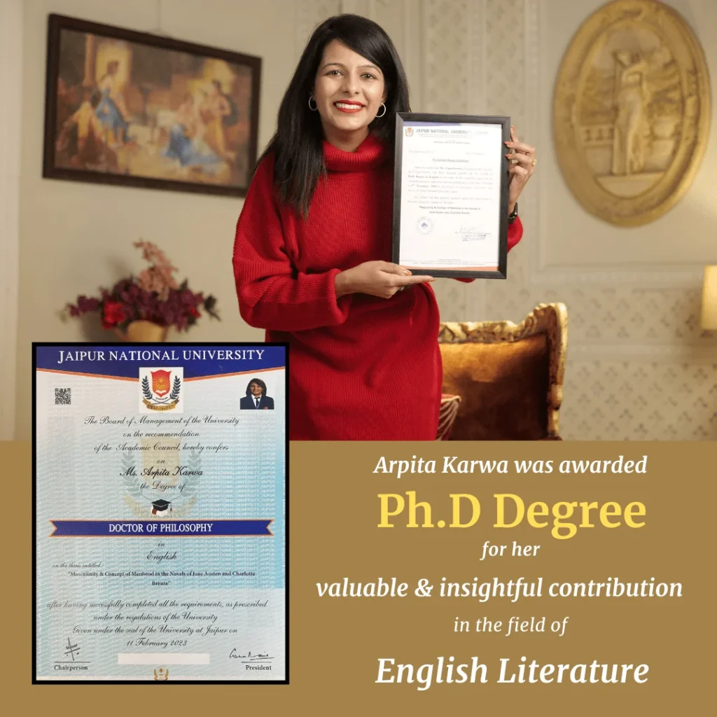 Dr. Arpita Karwa holding her Ph.D. degree certificate in English Literature